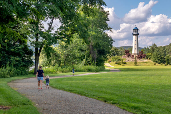 People walking the path around Lighthouse Island in Tionesta PA