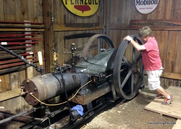 My guide starting the vintage equipment at the Penn-Brad Oil Museum in Bradford, Pennsylvania.