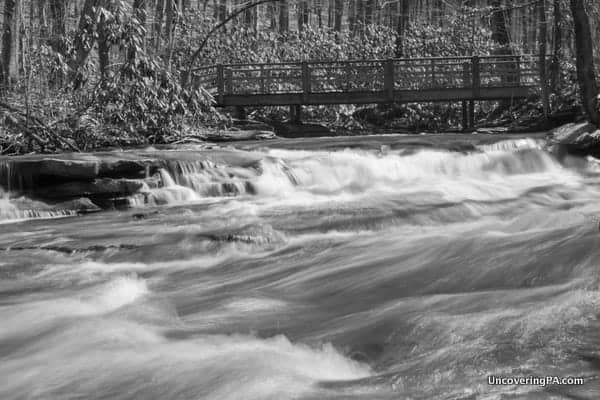The cascading Jonathan Run flows below a bridge on the Jonathan Run Trail.