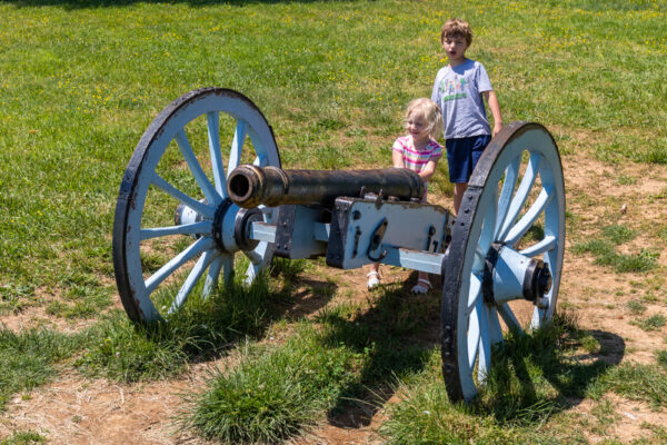 Kids playing with a canon at Valley Forge National Historical Park in Pennsylvania