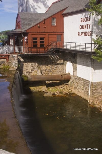 The waterfall and the Bucks County Playhouse from a bridge in New Hope.