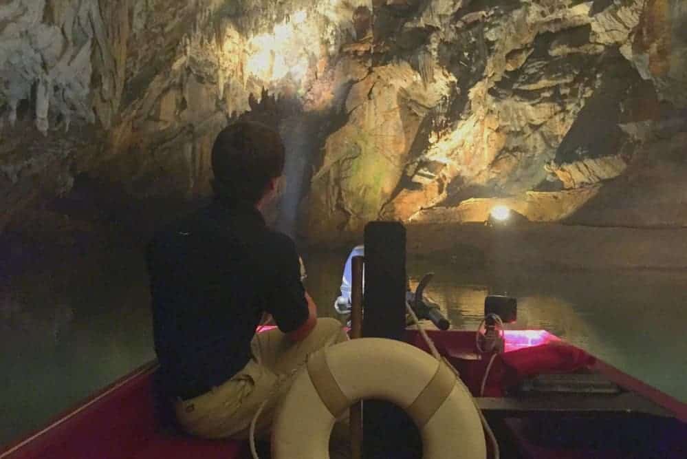 A tour boat rides through Penn's Cave in Centre Hall Pennsylvania