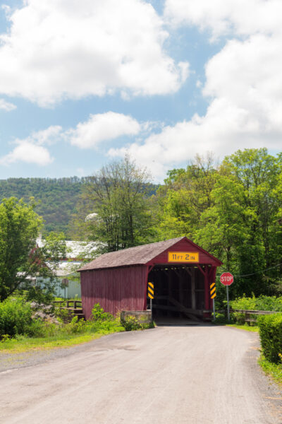 Looking down the road towards Logan Mills Covered Bridge in Clinton County PA