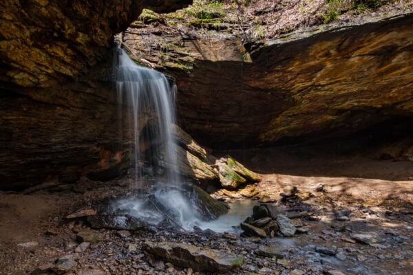 Head behind the veil at Frankfort Mineral Springs Falls in Raccoon Creek State Park