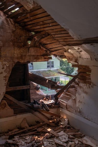 Hole in the roof at a home in Yellow Dog Village near Kittanning, PA