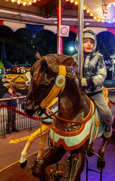 Riding the carousel during Hersheypark Christmas Candylane