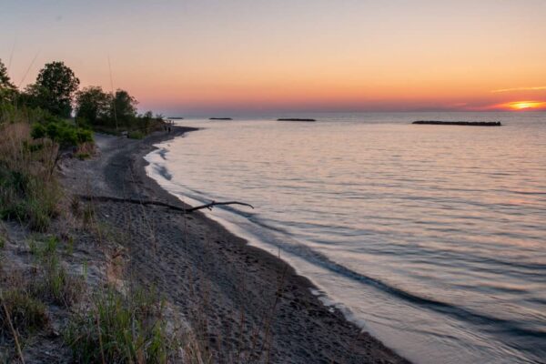 Presque Isle's beaches are a great spot to watch sunset.