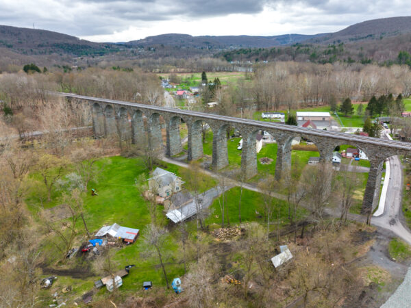 Drone photo of Starrucca Viaduct in PA surrounded by houses