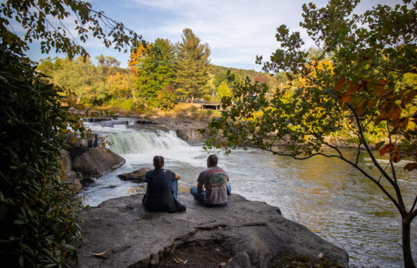 People enjoying Ohiopyle Falls along the Trails at Ferncliff Peninsula in Ohiopyle State Park