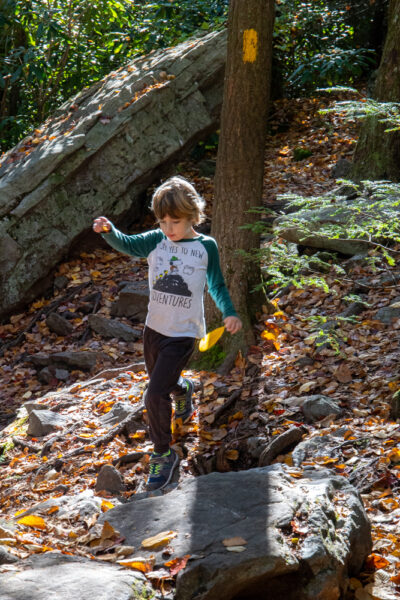 Boy hiking the Shades of Death Trail in Hickory Run State Park