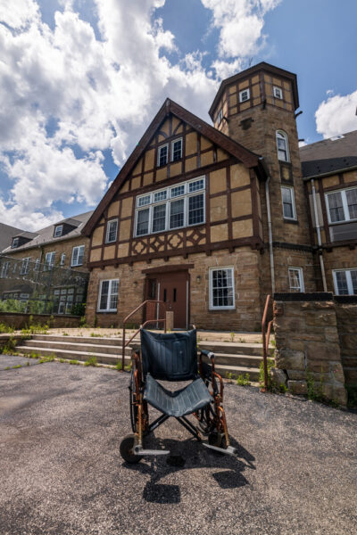 The exterior of the sanatorium building at the abandoned SCI Cresson in the Allegheny Mountains