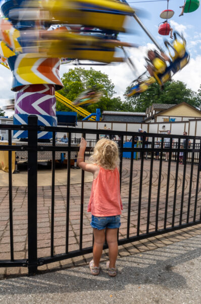 Child watching a ride at Dutch Wonderland in Lancaster County PA