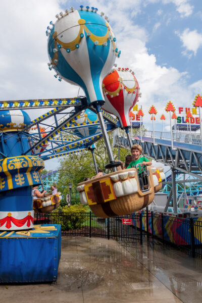 Kids riding a hot air balloon ride at Dutch Wonderland in Lancaster PA