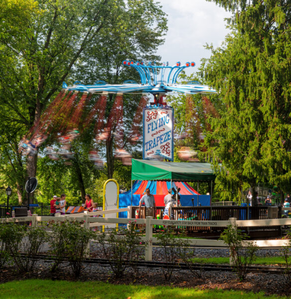 Swings rotating in the forest at Dutch Wonderland in Lancaster PA