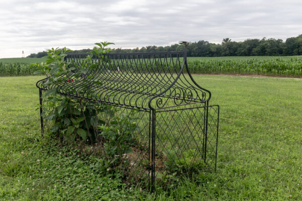 A grave covered with a metal grate in the Hooded Grave Cemetery in Catawissa PA