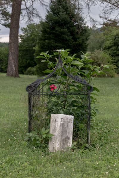 Gravestone in front of a hooded grave in Columbia County Pennsylvania