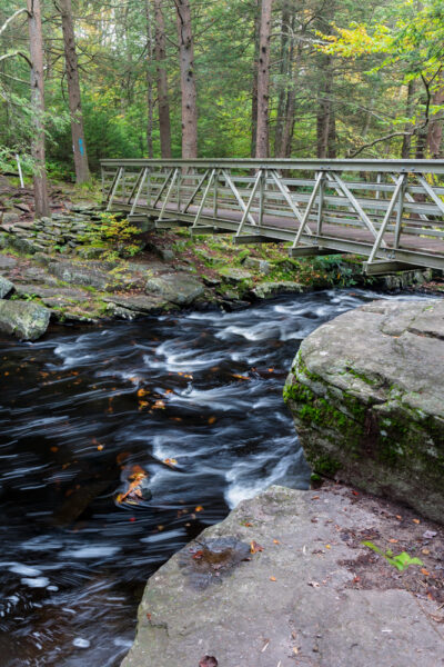 The wooden bridge just downstream of Little Falls in Promised Land State Park in PA