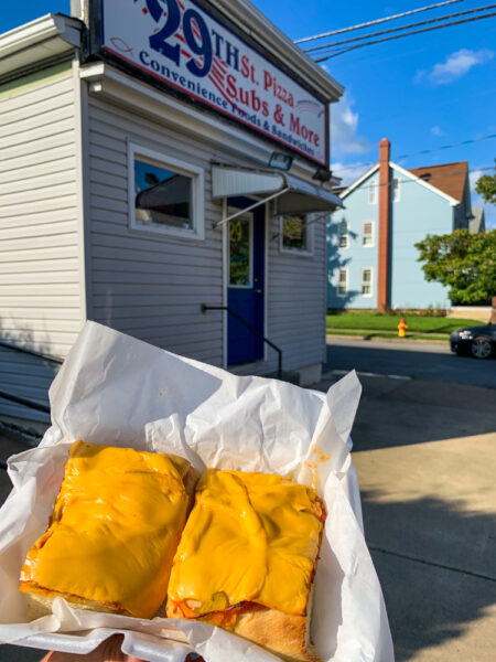 Outside of 29th Street Pizza, Subs, and More with my Altoona-Style Pizza.