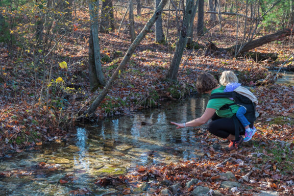 Woman at a spring along the Appalachian Trail in Michaux State Forest