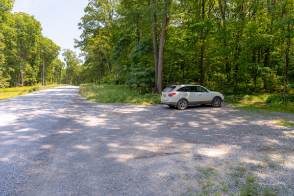 Car parking in the parking area for Panther Rocks in Clearfield County Pennsylvania.