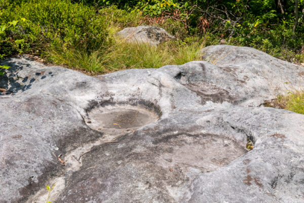Circular indentations in the rock at Panther Rocks in Clearfield County PA