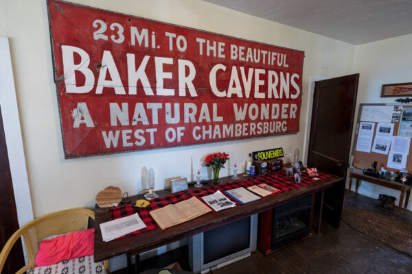 Large sign for Baker Caverns at Black-Coffey Caverns in Williamson PA