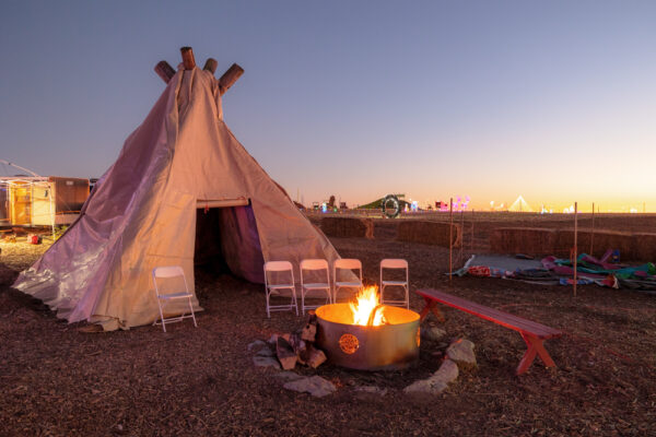 Fire pit in front of a teepee at the Christmas Lights at Country Creek Farm in Chambersburg PA