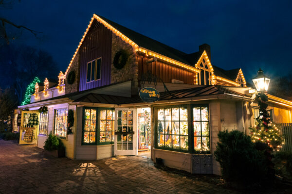 A store lit up in the evening at Peddler's Village in Bucks County, PA