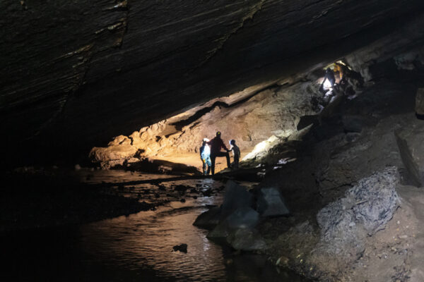 People exploring Tytoona Cave in Blair County Pennsylvania
