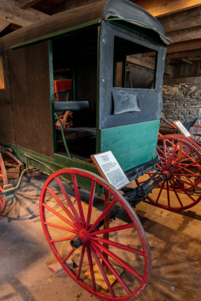 An antique buggy in the old showroom at the Mifflinburg Buggy Museum in Mifflinburg Pennsylvania