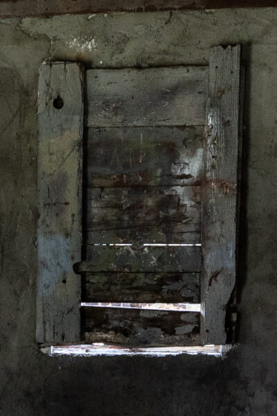 Face on wooden boards at the Haunted Quaker Church in Perryopolis PA