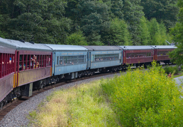 Train cars of different colors on the Lehigh Gorge Scenic Railway in Carbon County PA