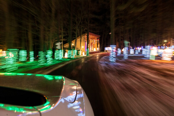 Car driving through the Christmas Light Up Celebration in Clinton PA