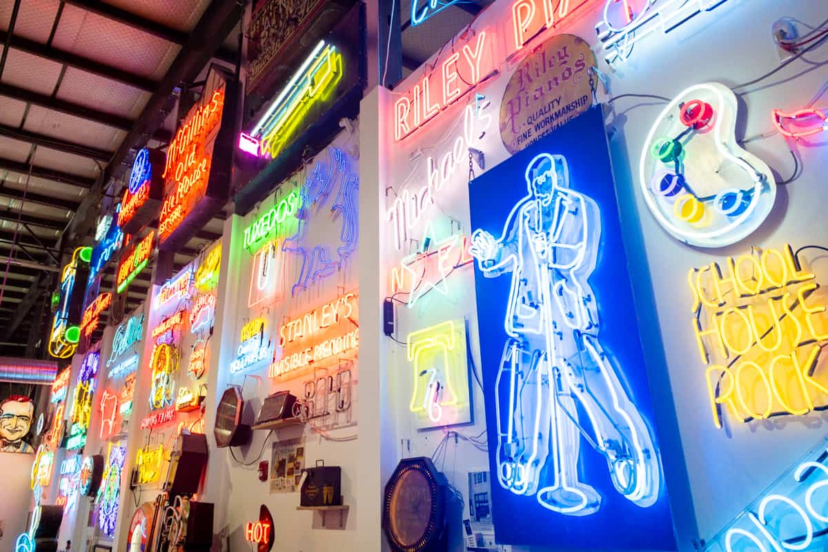 Historic signs line the walls in the Neon Museum of Philadelphia