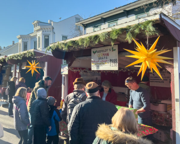 People buying traditional German food at the Mifflinburg Christkindl Market in PA