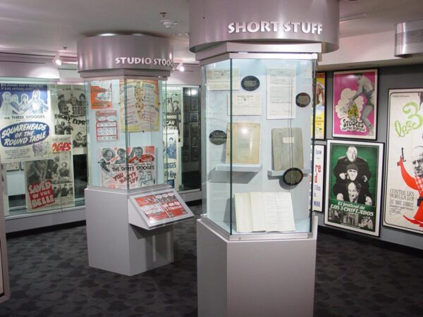 Artifacts on display in cases at The Three Stooges Museum in Ambler PA