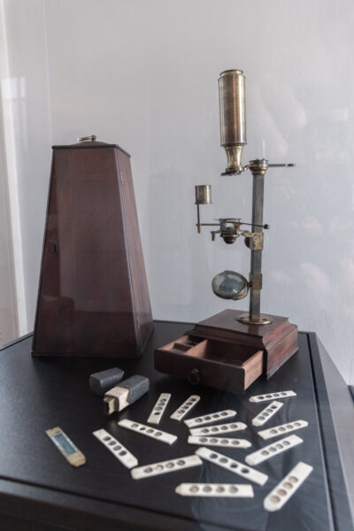 The microscope belonging to Joseph Priestley in a display case inside his home.