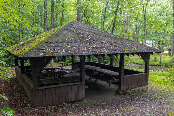 A pavilion surrounded by forest in Sand Bridge State Park.