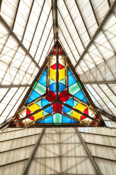 Color chandelier hanging from the ceiling in the sanctuary at Frank Lloyd Wright's Beth Sholom Synagogue in Pennsylvania