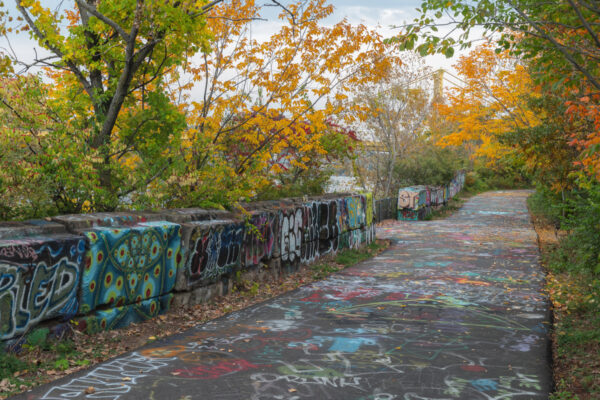 Graffiti along the Three Rivers Heritage Trail in The Color Park in Pittsburgh Pennsylvania