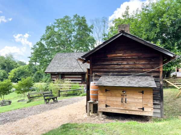 Two log buildings at the Oliver Miller Homestead in South Park near Pittsburgh.
