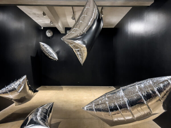 Large "silver clouds" float in the air at the Andy Warhol Museum in Pittsburgh Pennsylvania.