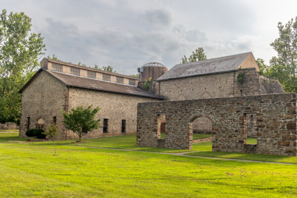 Several stone buildings that are part of the Lock Ridge Furnace Museum in the Lehigh Valley of PA