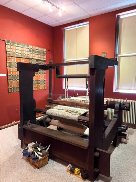 Large wooden loom on display at the National Museum of the American Coverlet in Bedford PA