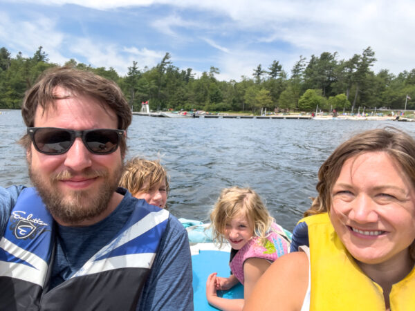 People sitting on a pedal boat in Eagles Mere PA