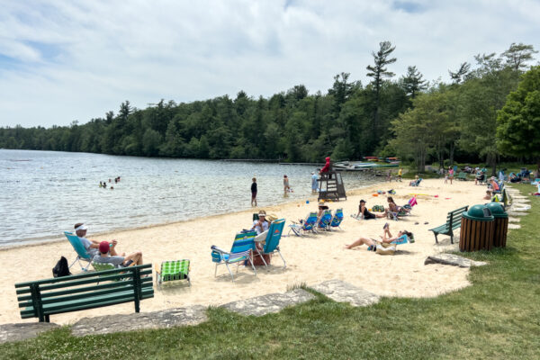 People relaxing at the beach in Eagles Mere PA