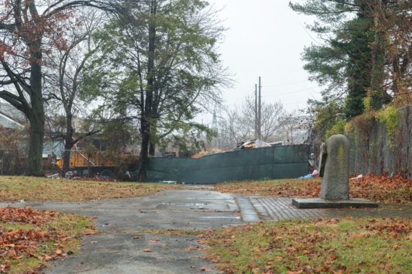 A junkyard behind the monument in the William Penn Landing Site in Delaware County PA