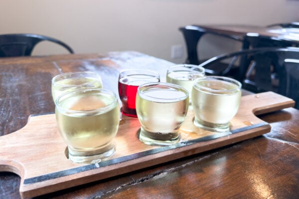 A flight of hard cider sitting on a table at 814 Cider Works near State College PA