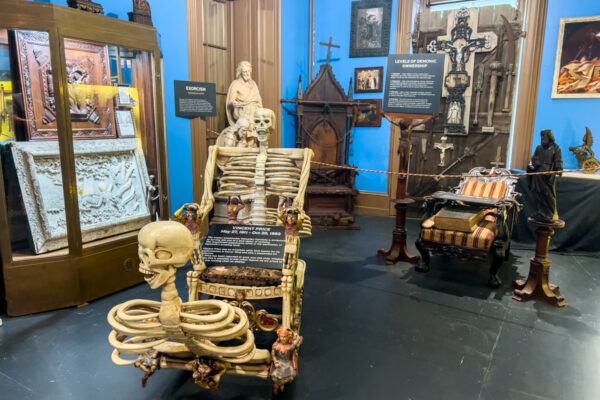 Skeleton chair sitting in the middle of a room at VAMPA Vampire and Paranormal Museum in Doylestown, Pennsylvania