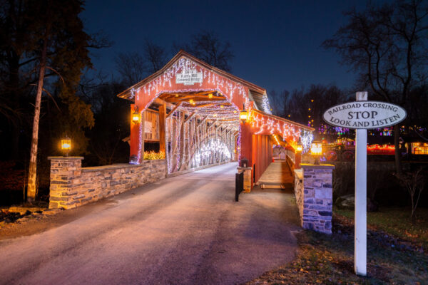 Covered bridge covered in Christmas lights at Stone Gables in Elizabethtown PA